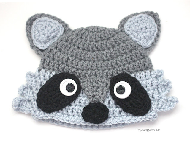 knitted hat for charity that looks like a raccoon
