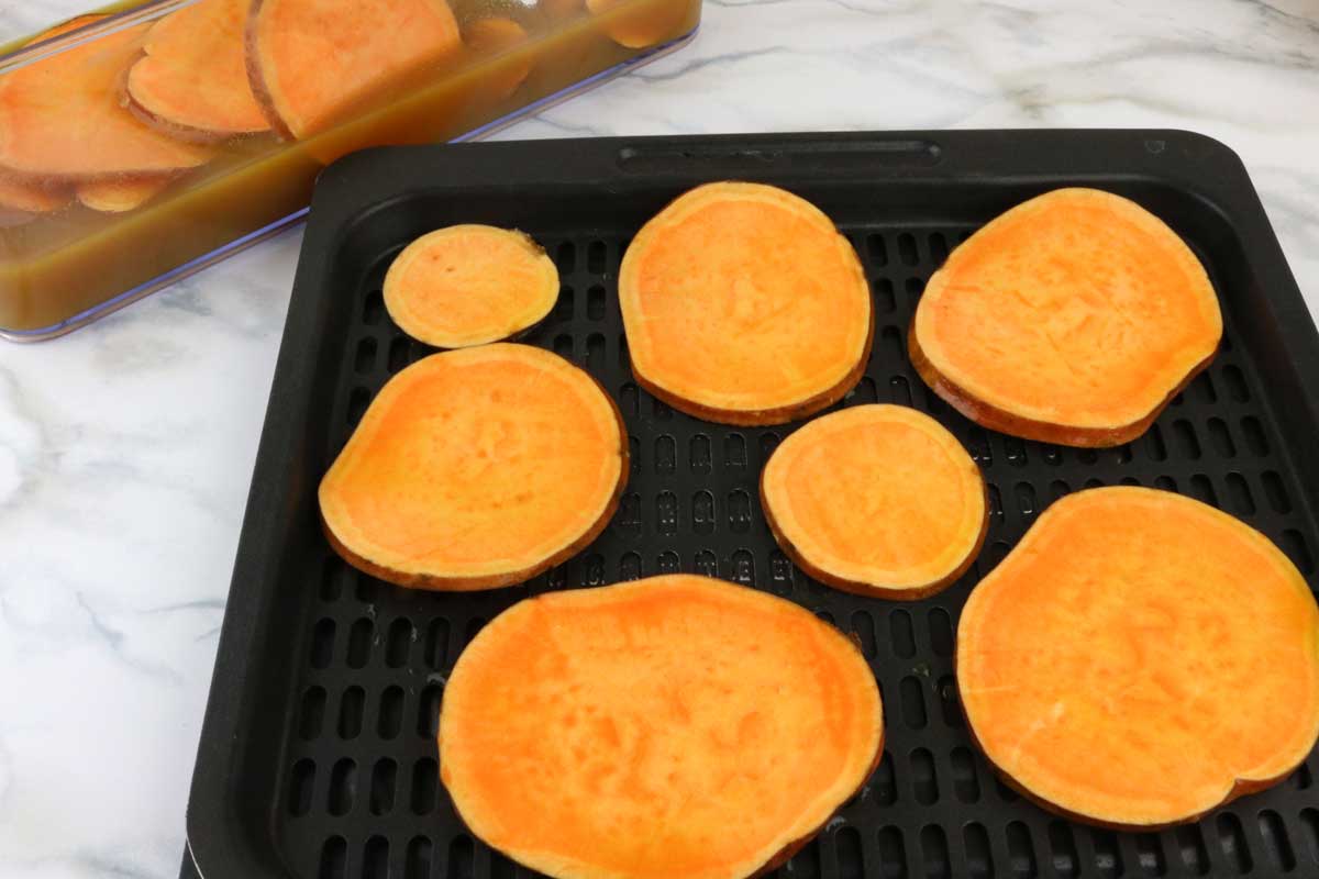 sweet potatoes on air fryer tray